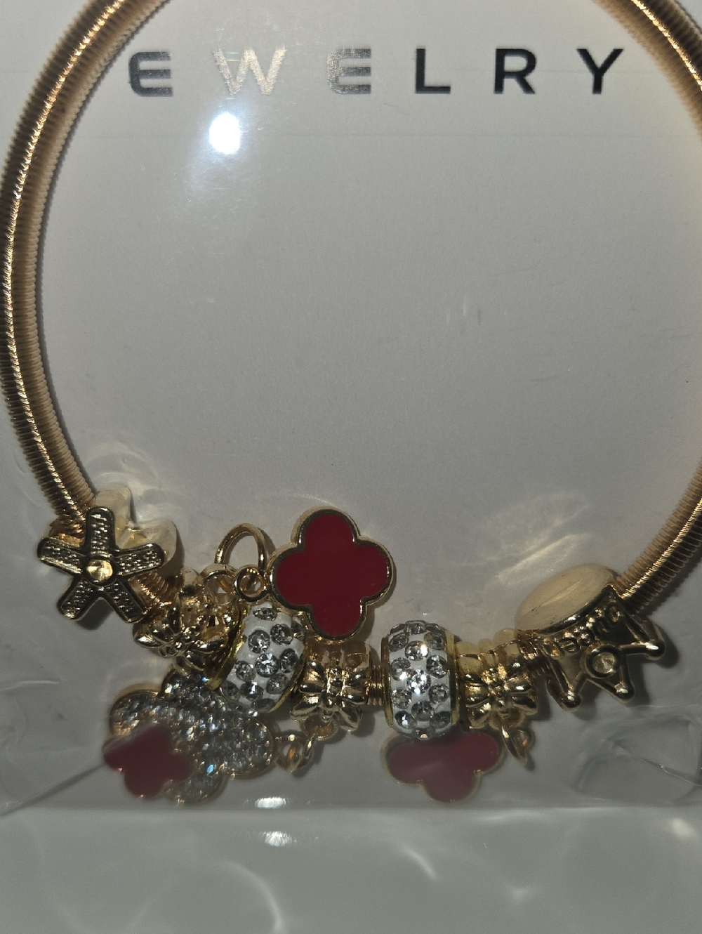 Gold-Tone Bracelet with Red Clover Charms